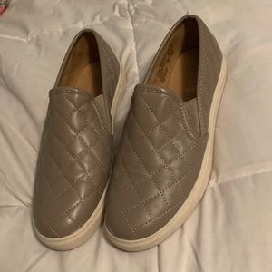 Tan slip on shoes